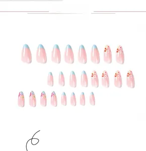 Detailed set of 24 almond press-on nails featuring blue French tips and floral designs