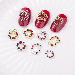 Bijoux d'ongles de Noël en forme de couronne et de nœud avec strass rouges et verts