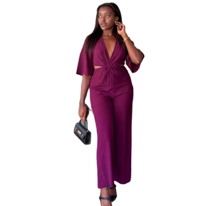 Deep V-neck cut-out waist jumpsuit with flared sleeves and wide-leg trousers in fuchsia