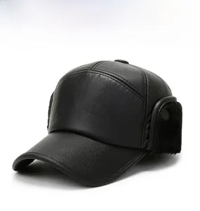 Close-up of winter thermal hat showing black leather texture and thick faux fur earflaps