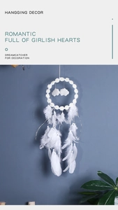 Detail of white daisy dream catcher with cloud pendants and soft glowing LED lights