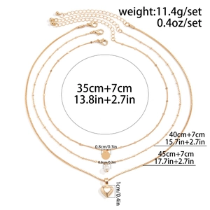 Detailed size chart for golden three-layer necklace with heart pendant and bead charms