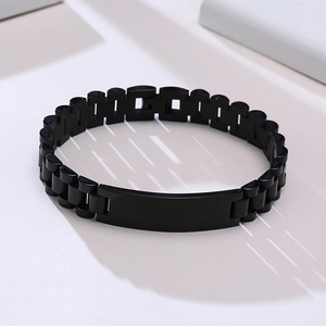 Detail shot of the black stainless steel watchband style bracelet with a smooth rectangle bar