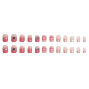 Pink gradient press-on nails with square rhinestones, heart motifs, and pearls