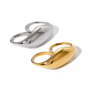 Polished 18k gold and silver chunky double finger rings with a sleek mirror finish