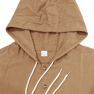 Close-up of khaki linen blend hooded shirt featuring neckline drawstrings and texture
