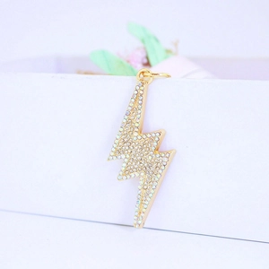 Chic golden lightning bolt keychain with shimmering crystals for women bags and car keys