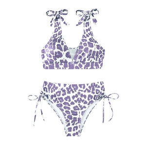 Two-piece purple leopard print bikini with a bow-tie bandeau top and high-waist side-tie bottoms