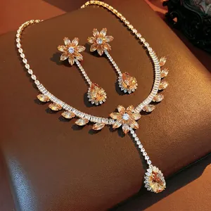 Exaggerated vintage flower necklace and earring set with champagne zircons and crystals