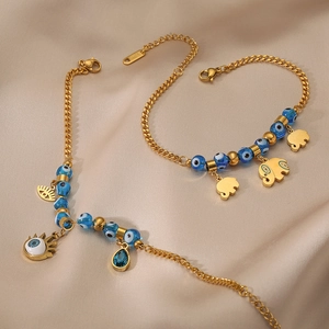 Bracciale boho in acciaio inossidabile dorato con perline malocchio e ciondolo elefante