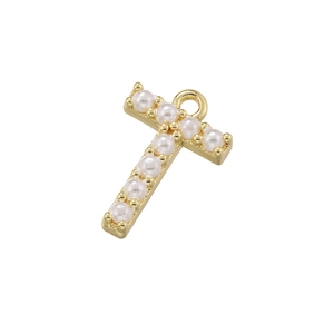 Detailed close-up of 18K gold-plated letter T pendant set with white pearls