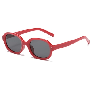 Classic oval red sunglasses with dark grey lenses and double stud detail for women