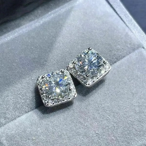 Sparkling geometric square stud earrings with round center stone and halo of pavé diamonds