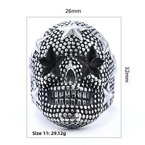 Detail view of vintage punk skull ring with star eyes, showing 26mm x 32mm dimensions