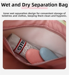 Detail of pink waterproof interior compartment for dry and wet item separation in gym bag