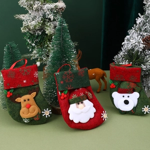 Three-piece Christmas stocking set with reindeer, Santa, and polar bear appliques