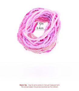 Detail showing pink and purple handmade bohemian beaded stretch bracelets with size specs