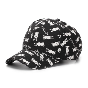 Black cotton baseball cap featuring white rabbit jacquard and curved brim for sun protection