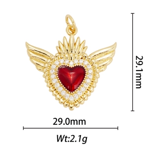 Detail showing 2.1g gold heart wing pendant with red gemstone and white zircons