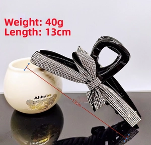 Detailed view of the 13cm sparkling rhinestone claw clip showing size and dimensions
