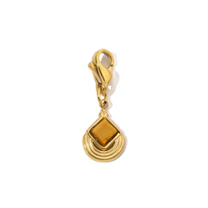 Detailed view of a bohemian gold pendant with lobster clasp and square tiger eye stone