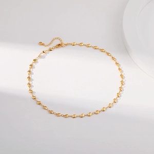 Minimalist oval bean link chain necklace in 18K gold plated brass on white background