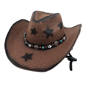Brown straw cowboy hat with black stars, turquoise beads, and wide brim for sun protection
