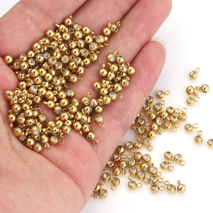 Golden stainless steel slider beads with silicone inserts and hanging loops for DIY jewelry