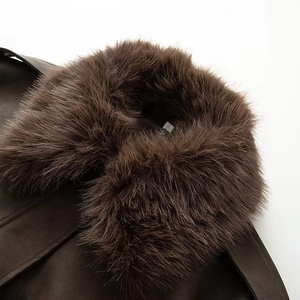 Detail of detachable dark brown faux fur collar and textured PU leather vintage jacket
