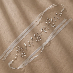 Elegant silver vine bridal headband with sparkling crystals, beads, and white ribbons
