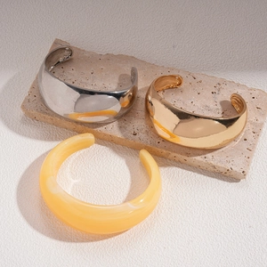 18k gold plated geometric open bangles in minimalist silver, gold and cream resin finish