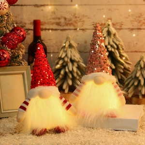 Lighted Christmas gnomes with sequin hats and warm LED lights for holiday home decor