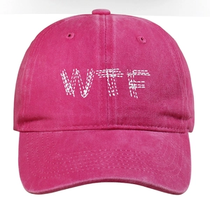Close-up of pink washed cotton baseball cap featuring white WTF embroidery detail