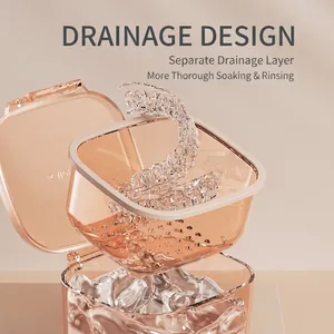 Three-layer clear orange dental retainer case with a drainage filter for easy soaking