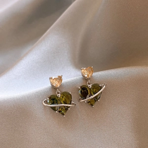 Green heart zircon planet earrings with olive stone and champagne gold top on silk