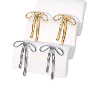 Boucles d'oreilles nœud en acier inoxydable poli, finitions dorées et argentées chic