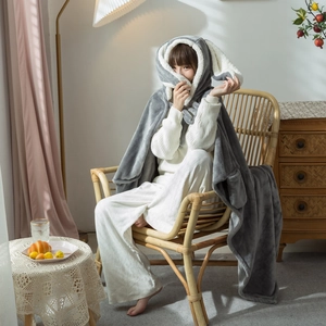 Detail of grey hooded bunny ear blanket cloak showing soft lamb velvet inner lining