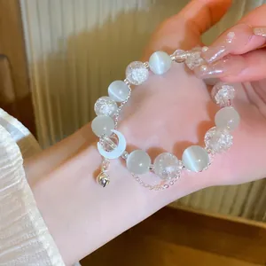 Beaded Bracelet With Cat Eye Stone Crackle Glass Beads White Moon Pendant And Silver Bell Elegant Jewelry For Women