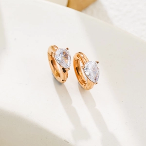 Elegant gold titanium steel hoop earrings with sparkling pear-cut zircon drop accents