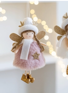 Close-up of a pink plush Christmas angel pendant with golden antlers and star detail