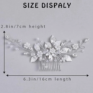Silver bridal hair comb featuring leaf details, pearls, and size dimensions of 16cm by 7cm