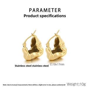 Macro shot of 18K gold plated stainless steel earrings with irregular wavy texture