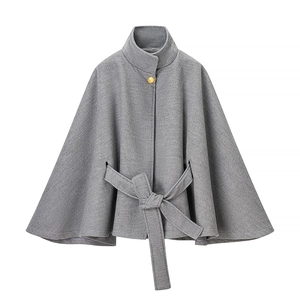 Fashionable grey short wool blend coat with stand collar, waist tie, and golden button accent