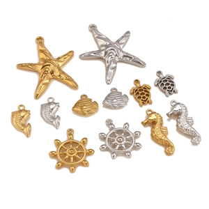 Ocean theme pendants featuring starfish sea turtles and rudders in gold and silver finish