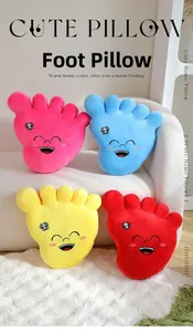 Colorful plush foot-shaped pillows with cartoon faces displayed on a cozy sofa