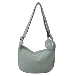 Mint green corduroy crescent crossbody bag with adjustable strap and small coin purse