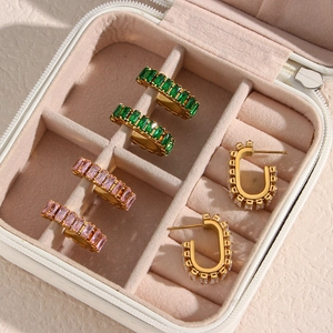 U-shaped gold plated earrings with rectangular zircon in green, pink, and white