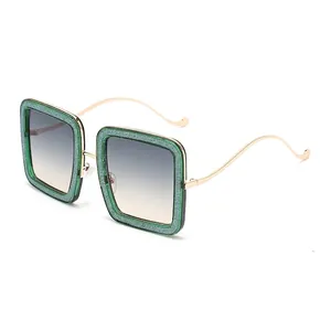 Chic square women's sunglasses with green glitter frames and gold wavy temples