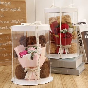Detailed view of Teddy Bear gift sets with soap flower bouquets in transparent boxes