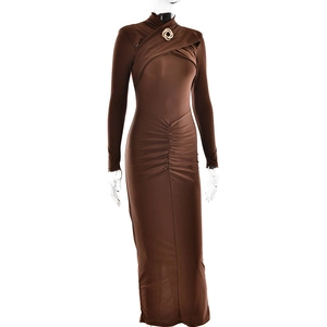 Detail of a brown long sleeve dress featuring a gold ring neck and pleated waist design
